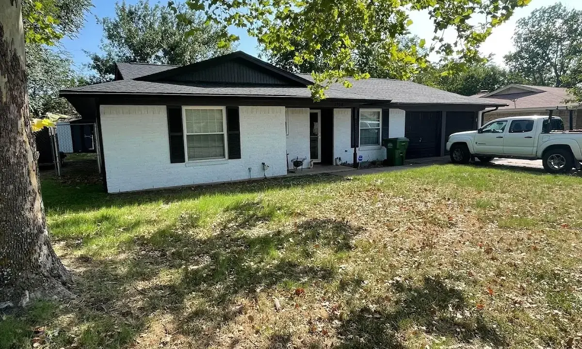 Professional roofing crew working on a residential roof in Casselberry